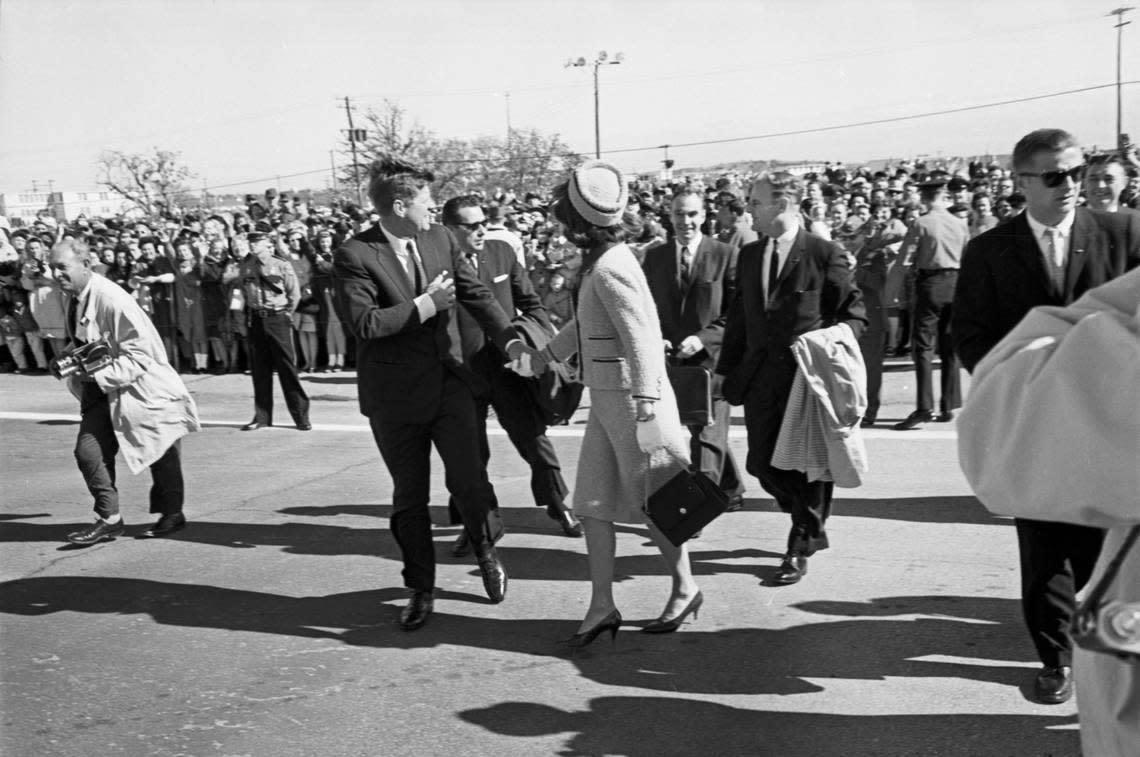 President John F. Kennedy holding hands with Jackie Kennedy during their visit to Fort Worth at Carswell Air Force Base on their way to Dallas Love Field. Nov. 22, 1963.
