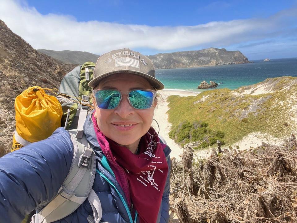 Ana Cholo hikes on San Miguel Island in Channel Islands National Park.