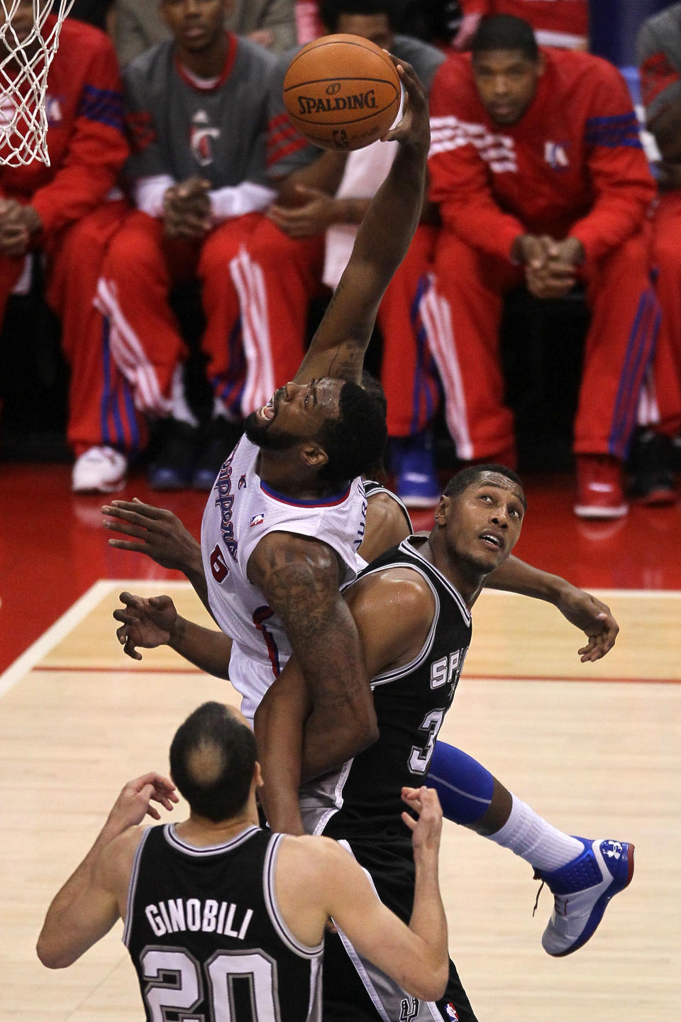 LOS ANGELES, CA - MAY 20: DeAndre Jordan #6 of the Los Angeles Clippers is tangled up with Boris Diaw #33 of the San Antonio Spurs on a shot in the lane in Game Four of the Western Conference Semifinals in the 2012 NBA Playoffs on May 20, 2011 at Staples Center in Los Angeles, California. NOTE TO USER: User expressly acknowledges and agrees that, by downloading and or using this photograph, User is consenting to the terms and conditions of the Getty Images License Agreement. (Photo by Jeff Gross/Getty Images)