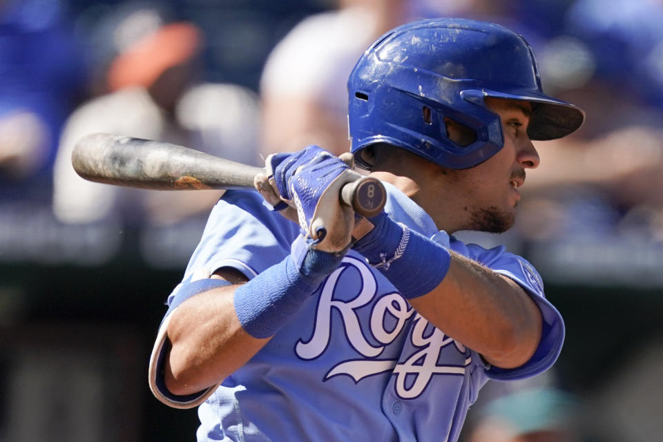 Kansas City Royals' Nicky Lopez hits an RBI single during the sixth inning of a baseball against the Seattle Mariners game Sunday, Sept. 19, 2021, in Kansas City, Mo. (AP Photo/Charlie Riedel)