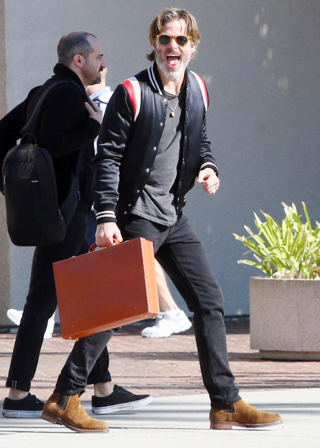 Travis Scott casually carries giant Hermès bag while strolling