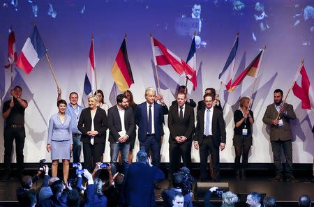 (L-R) Germany's Alternative for Germany (AfD) leader Frauke Petry, France's National Front leader Marine Le Pen, Italian Matteo Salvini of the Northern League, Netherlands' Party for Freedom (PVV) leader Geert Wilders, Harald Vilimsky of Austria's Freedom Party (FPOe) and Marcus Pretzell, ENF group member of the European Parliament arrive on stage for a European far-right leaders meeting to discuss about the European Union, in Koblenz, Germany, January 21, 2017. REUTERS/Wolfgang Rattay