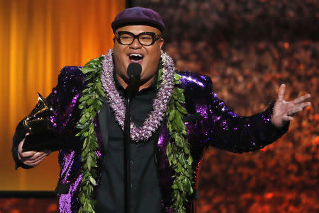 61st Grammy Awards - Show - Los Angeles, California, U.S., February 10. 2019 - Kalani Pe'a reacts after winning Best Regional Roots Music Album for "No 'Ane'I" REUTERS/Mike Blake