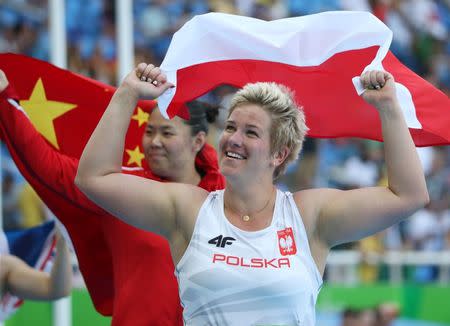 2016 Rio Olympics - Athletics - Final - Women's Hammer Throw Final - Olympic Stadium - Rio de Janeiro, Brazil - 15/08/2016. Anita Wlodarczyk (POL) of Poland reacts after setting a new world record. REUTERS/Alessandro Bianchi