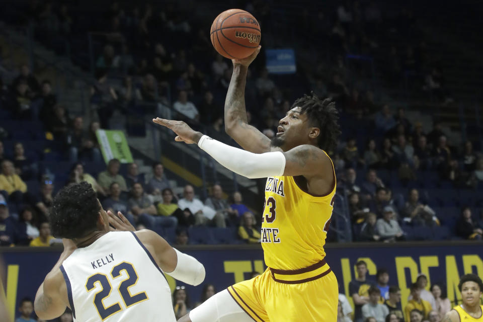 Arizona State forward Romello White, right, shoots next to California forward Andre Kelly (22) during the first half of an NCAA college basketball game in Berkeley, Calif., Sunday, Feb. 16, 2020. (AP Photo/Jeff Chiu)