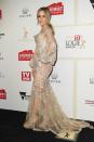 <p>Jessica Marais looked breathtaking in sheer J’Aton Couture gown with gleaming jewels.</p>