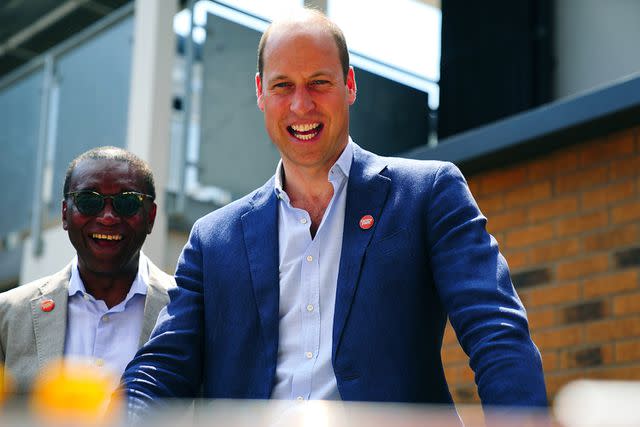 <p>Victoria Jones - WPA Pool/Getty Images</p> Prince William and Seyi Obakin of charity Centrepoint