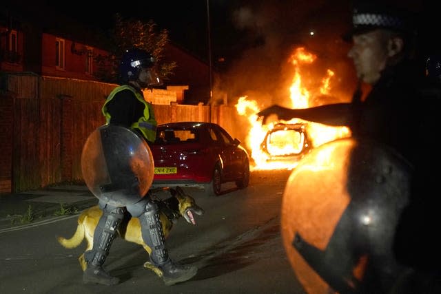 A police car burning