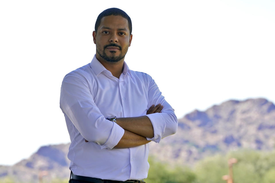 Democratic Congressional candidate Jevin Hodge stands for a photo, Wednesday, Oct. 12, 2022, in Scottsdale, Ariz. Hodge is trying t unseat U.S. Rep. David Schweikert, R-Ariz. in November. (AP Photo/Matt York)