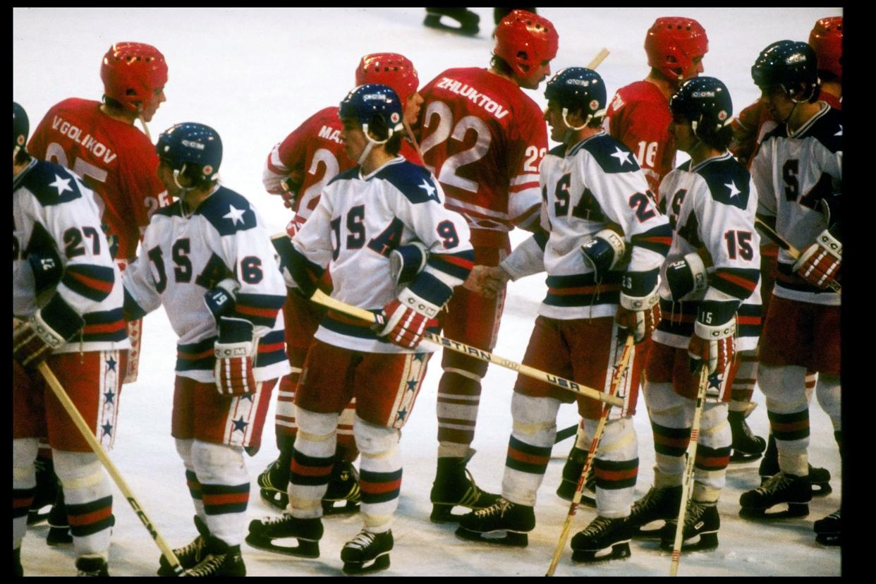 teams from the United States and the Soviet Union shaking hands after the semifinal hockey game during the Winter Olympics in Lake Placid, New York, 1980