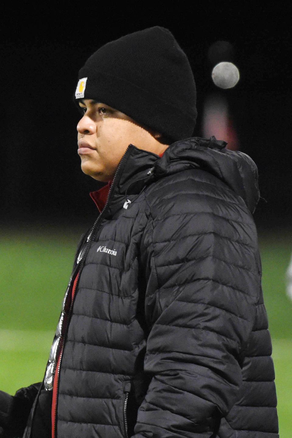 Fort Walton Beach High School soccer coach Mario Rodriguez watches his team from the sidelines during Thursday's home game against Niceville High School.