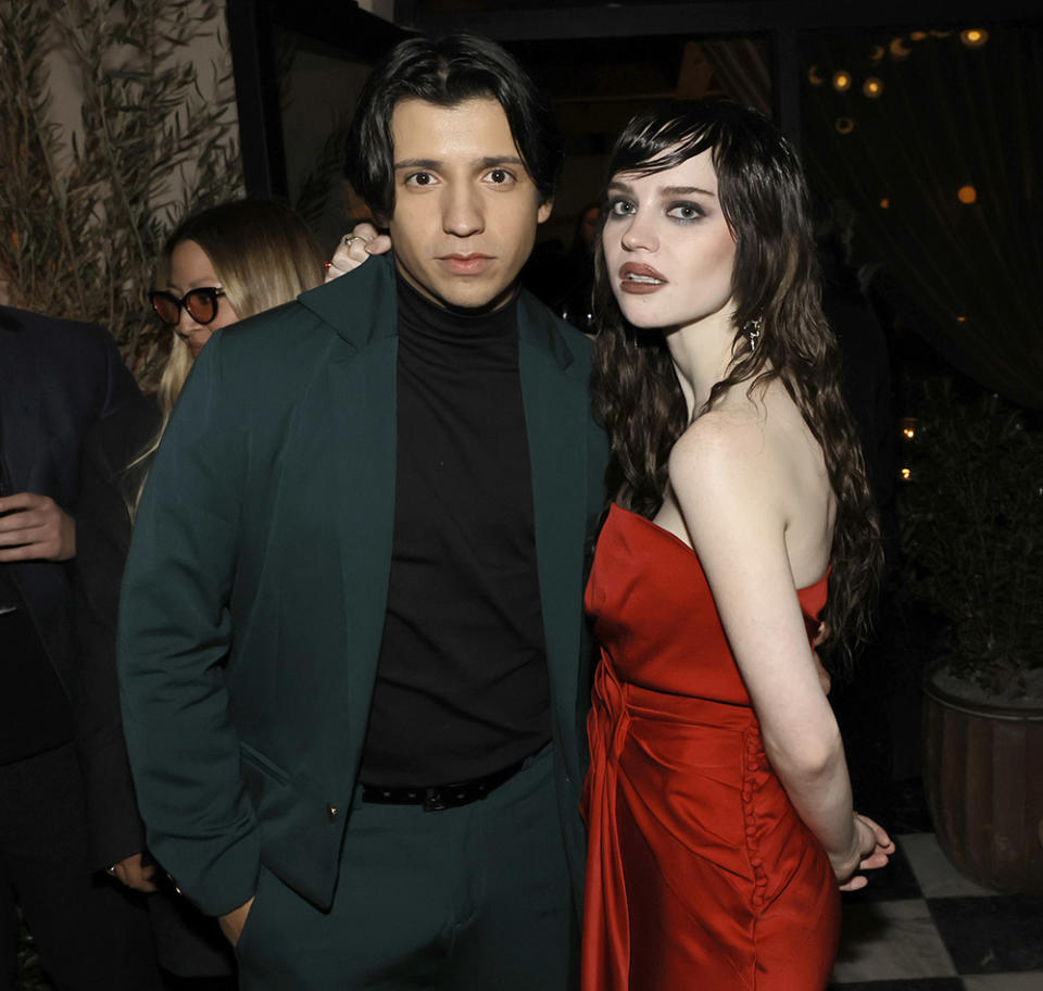 Kevin Alves (L) and Sophie Thatcher pose at the after party for the world premiere of Showtime's "Yellowjackets" season two at Lavo Restorante on March 22, 2023 in West Hollywood, California.