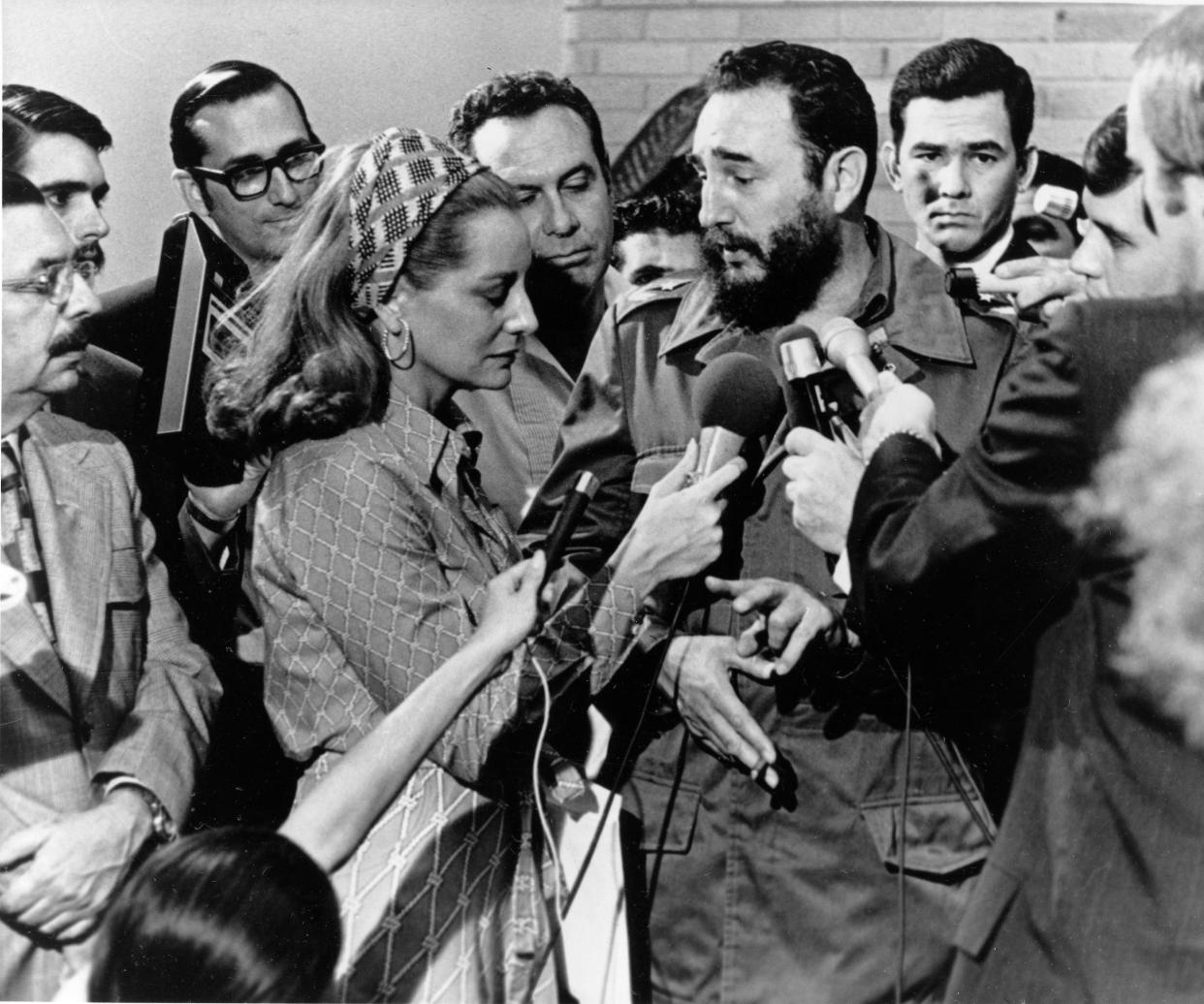 Barbara Walters poses a question to Cuban Prime Minister Fidel Castro at a news conference in Havana in 1975.
