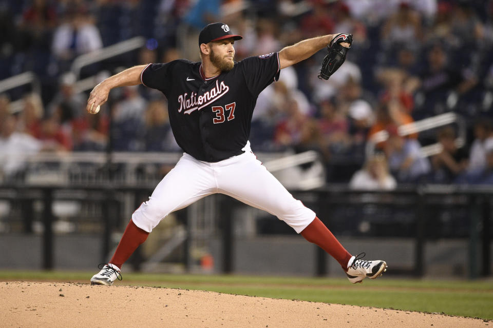 FILE - Washington Nationals starting pitcher Stephen Strasburg delivers during a baseball game against the Baltimore Orioles, May 21, 2021, in Washington. Strasburg is recovering from thoracic outlet syndrome surgery and has pitched a total of 26 2/3 innings since the start of the 2020 season. (AP Photo/Nick Wass, File)