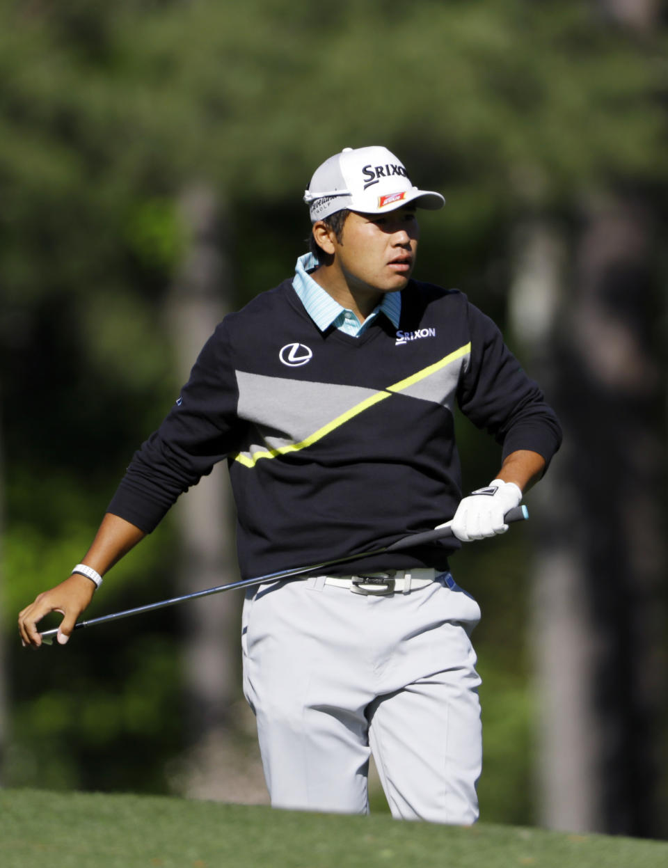 Hideki Matsuyama, of Japan, watches his tee shot on the 12th hole during the third round of the Masters golf tournament Saturday, April 9, 2016, in Augusta, Ga. (AP Photo/David J. Phillip)