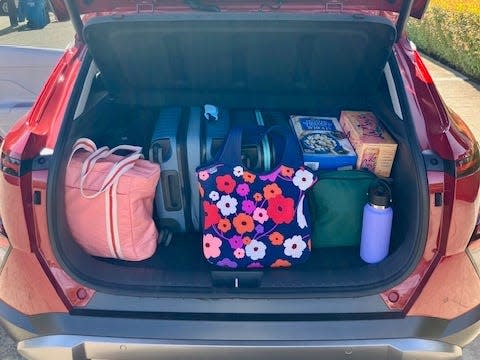 Luggage is packed in the back of a 2024 Hyundai Kona