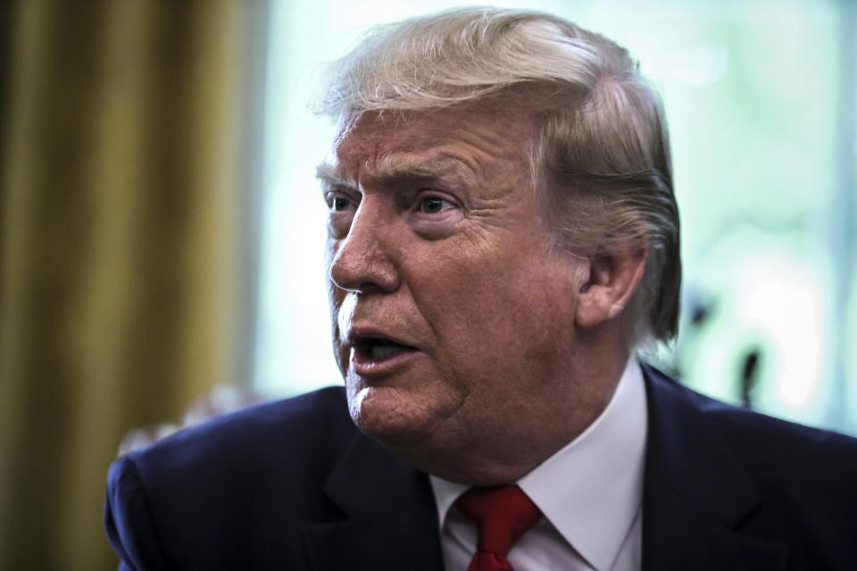 WASHINGTON, DC - JUNE 24: President Donald Trump speaks prior signing an executive order imposing fresh sanctions on Iran in the Oval Office of the White House on June 24, 2019 in Washington, DC. Next to Trump, Vice President Mike Pence. (Photo by Oliver Contreras/For The Washington Post via Getty Images)