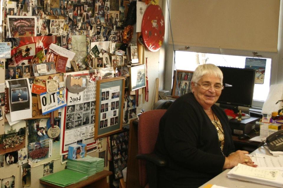 Mary Jane Mullen, who worked at Lenape High School for 61 years until her death on May 14, is shown at her desk in the Medford school.