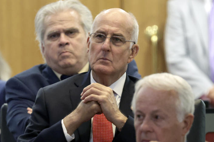 Rep. Ted Davis, Jr. (R), center, listens Tuesday, May 16, 2023, in Raleigh, N.C., as the North Carolina House members debate whether to override Democratic Gov. Roy Cooper's veto of a bill that would change the state's ban on nearly all abortions from those after 20 weeks of pregnancy to those after 12 weeks of pregnancy. Both the Senate and House had to complete successful override votes for the measure to be enacted into law. The Senate voted to override the veto earlier and the House also voted to override. (AP Photo/Chris Seward)