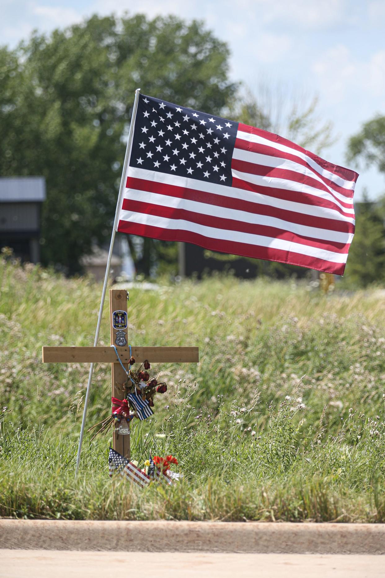 A memorial sits at the scene of a fatal crash on Winnebago Drive, just west of U.S. 151 near Fond du Lac, where Phillip Thiessen, 55, of Fond du Lac was killed June 3, 2020. Daniel Navarro of Fond du Lac is charged with using his vehicle to intentionally hit Thiessen, who was on a motorcycle.