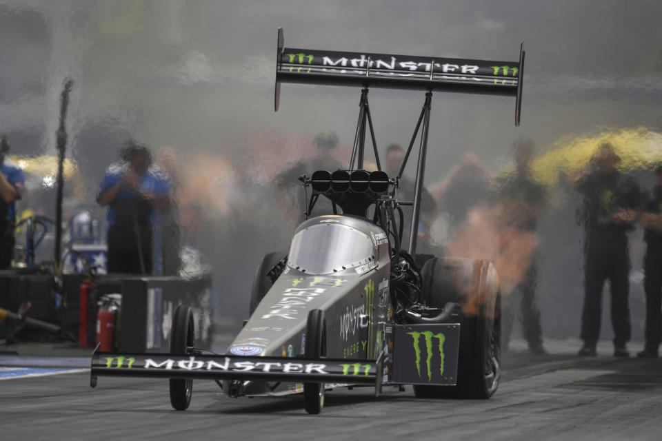 In this photo provided by the NHRA, Brittany Force drives in Top Fuel at the NHRA Four-Wide Nationals drag races at The Strip at Las Vegas Motor Speedway on Sunday, April 3, 2022, in Las Vegas. (Marc Gewertz/NHRA via AP)