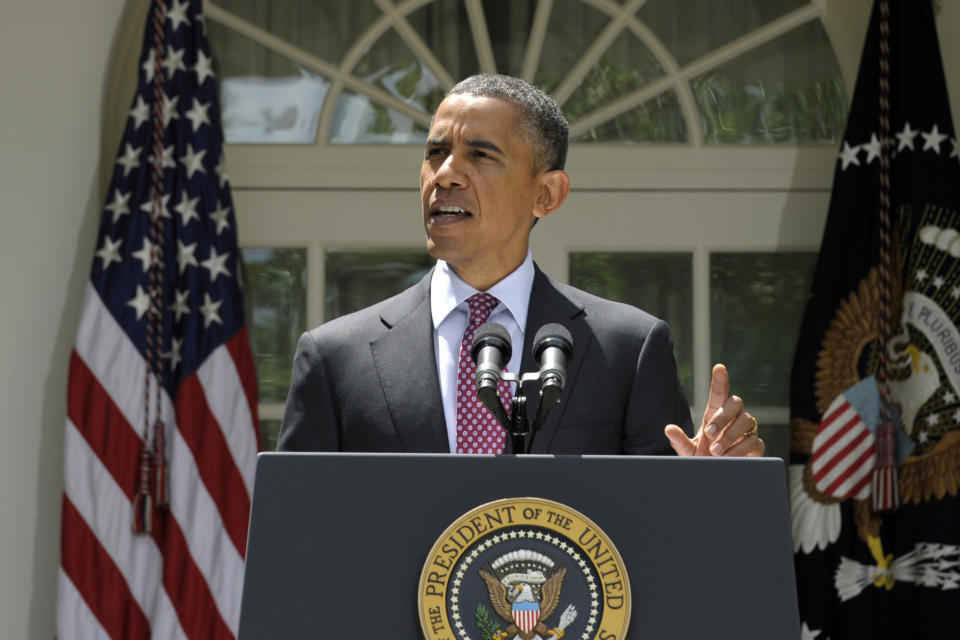 FILE - President Barack Obama announces that his administration will stop deporting and begin granting work permits to younger immigrants living in the country illegally who came to the U.S. as children and have since led law-abiding lives, during a statement in the Rose Garden of the White House in Washington, June 15, 2012. Obama in 2012 unilaterally enacted the Deferred Action for Childhood Arrivals program, which is still standing today. (AP Photo/Susan Walsh, File)