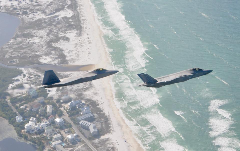 A F-22 Raptor from the 325th Fighter Wing at Tyndall Air Force Base flies alongside a F-35 Lightning II from the 33rd Fighter Wing over the Emerald Coast on May 15, 2020.