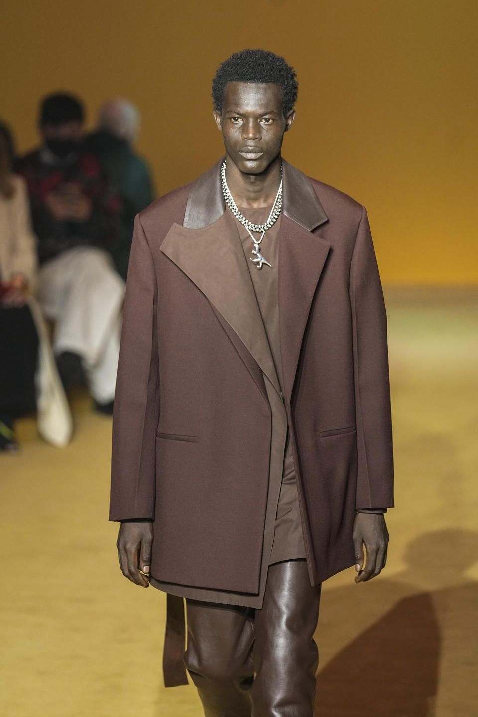 A model wears a creation for the Jil Sander fall-winter 22/23 men's collection, in Paris, Friday, Jan. 21, 2022. (AP Photo/Michel Euler)