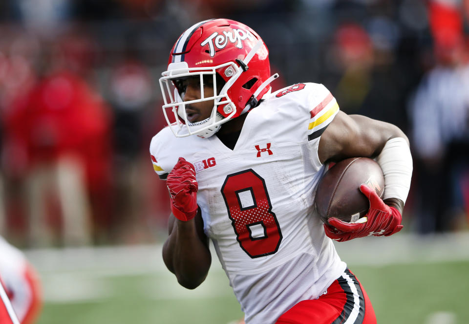 Maryland running back Tayon Fleet-Davis (8) rushes against Rutgers during the first half of an NCAA football game, Saturday, Nov. 27, 2021, in Piscataway, N.J. (AP Photo/Noah K. Murray)