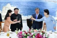 South Korea's President Moon Jae-in (2nd R) said the North's moratorium on nuclear and long-range missile tests is "very significant"