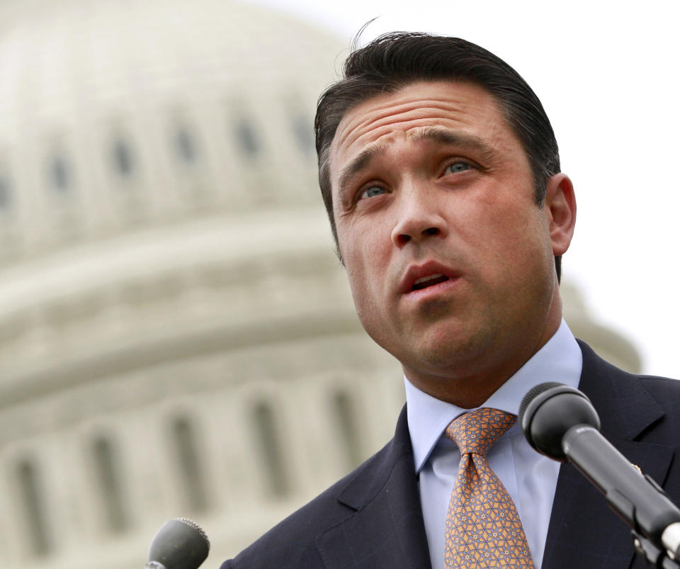 FILE - In this May 9, 2012 file photo, Rep. Michael Grimm, R-N.Y., speaks at a news conference on Capitol Hill in Washington. In the fall of 2009, when Grimm announced his run for congress, he sorely needed a rainmaker who could get the dollars flowing to his nascent campaign. He found one in an Israeli Rabbi Pinto, but now that fruitful association has turned into a big headache for the Staten Island Republican - one involving allegations of illegal donations, a bizarre blackmail claim and potentially embarrassing associations with people in the pornography business. (AP Photo/Jacquelyn Martin, File)