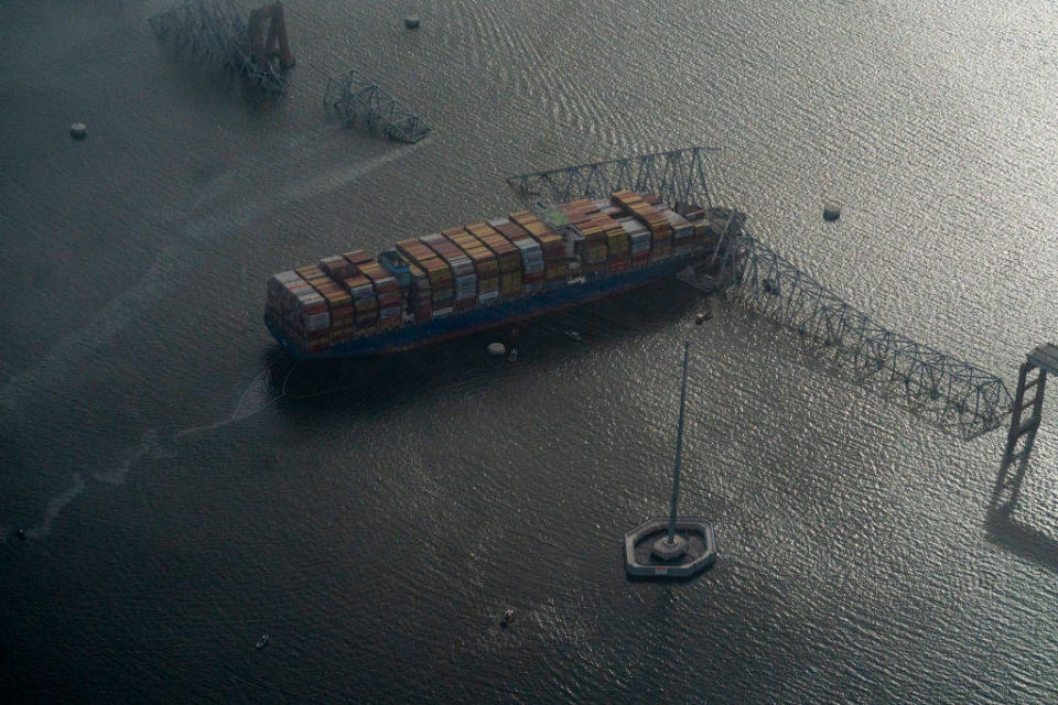 The scene where Singapore-flagged container vessel Dali crashed into the Francis Scott Key Bridge in Baltimore, MD on March 26, 2024. / Credit: Carolyn Van Houten/The Washington Post via Getty Images