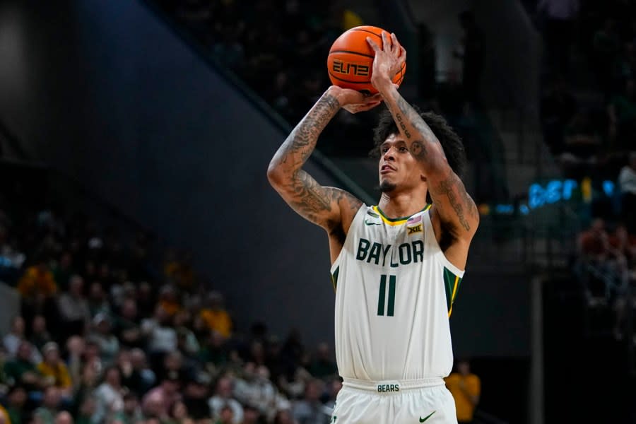 Baylor’s Jalen Bridges shoots a basket against Texas during the first half of an NCAA college basketball game, Monday, March 4, 2024, in Waco, Texas. (AP Photo/Julio Cortez)