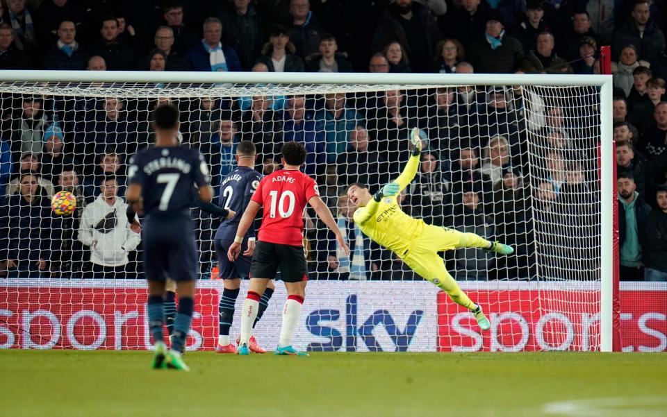 Kyle Walker-Peters (not pictured) scores the opening goal, curling the ball past Manchester City goalkeeper Ederson with the outside of his foot - Andrew Matthews/PA Wire.