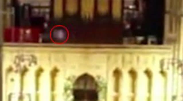 The 'figure' appears to be moving from one side of the cathedral to the other. Source: YouTube.