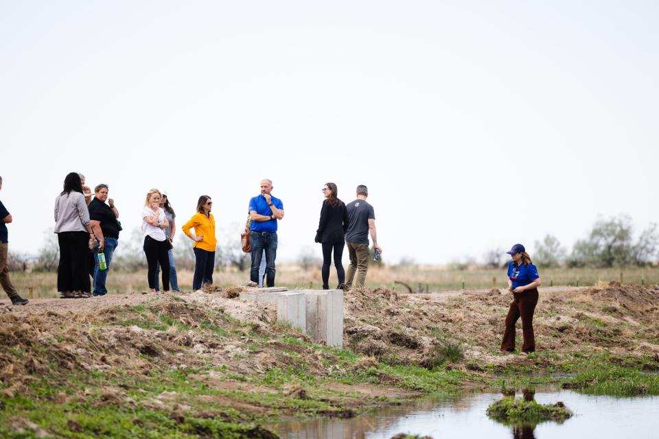 Visitors walk around the new wetlands following the completion of the Freeport Drain project at the Great Salt Lake Shorelands Preserve in Layton on Wednesday, May 17, 2023. | Ryan Sun, Deseret News