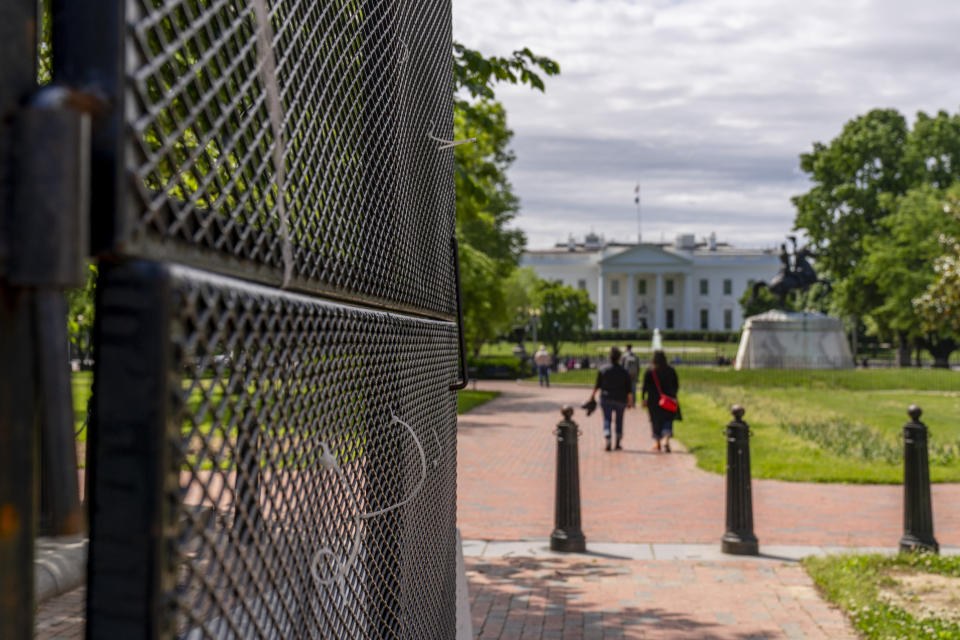 Lafayette Park, across the street from the White House, reopens in a limited capacity in Washington, Monday, May 10, 2021. Fencing remains in place around the park which will allow the Secret Service to temporarily close the park as they deem necessary. (AP Photo/Andrew Harnik)