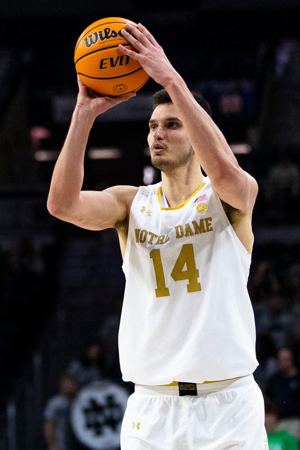 Notre Dame's Nate Laszewski (14) shoots during the second half of an NCAA college basketball game against Virginia Tech, Saturday, Feb. 11, 2023 in South Bend, Ind. (AP Photo/Michael Caterina)