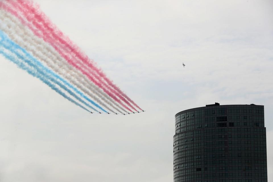 The Red Arrows flew over Belfast around 2.15pm (PA)