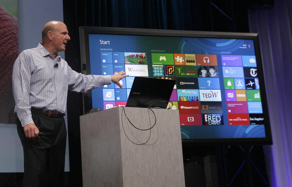 Microsoft CEO Steve Ballmer, Kirk Koenigbauer speaks at a Microsoft event in San Francisco,Monday, July 16, 2012. Microsoft unveiled a new version of its widely used, lucrative suite of word processing, spreadsheet and email programs Monday, one designed specifically with tablet computers and Internet-based storage in mind. (AP Photo/Jeff Chiu)