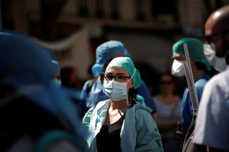 French health care workers attend a demonstration against the French government's reform plans in Paris as part of a national day of protest, France, April 19, 2018. REUTERS/Benoit Tessier