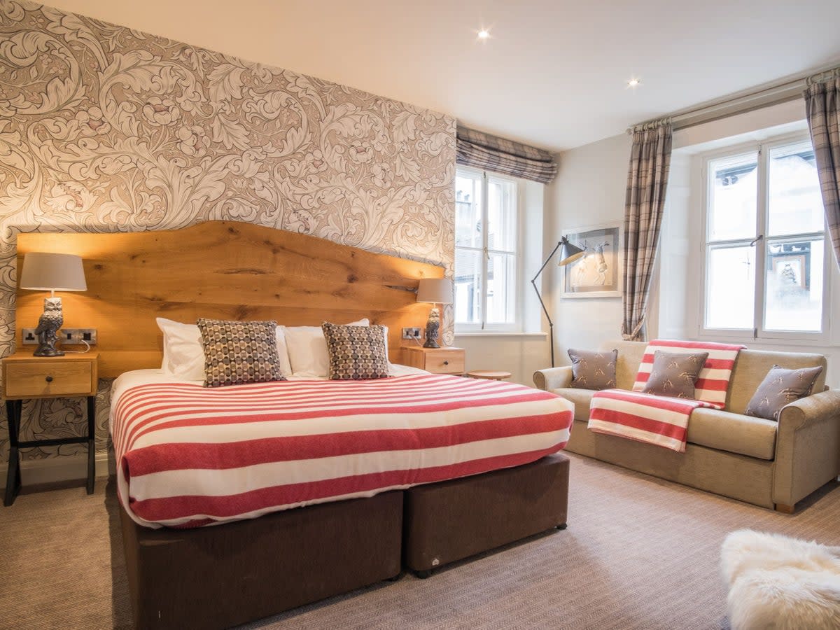 Luxury wallpaper and bespoke oak furniture make for a homely stay (The Royal Oak)