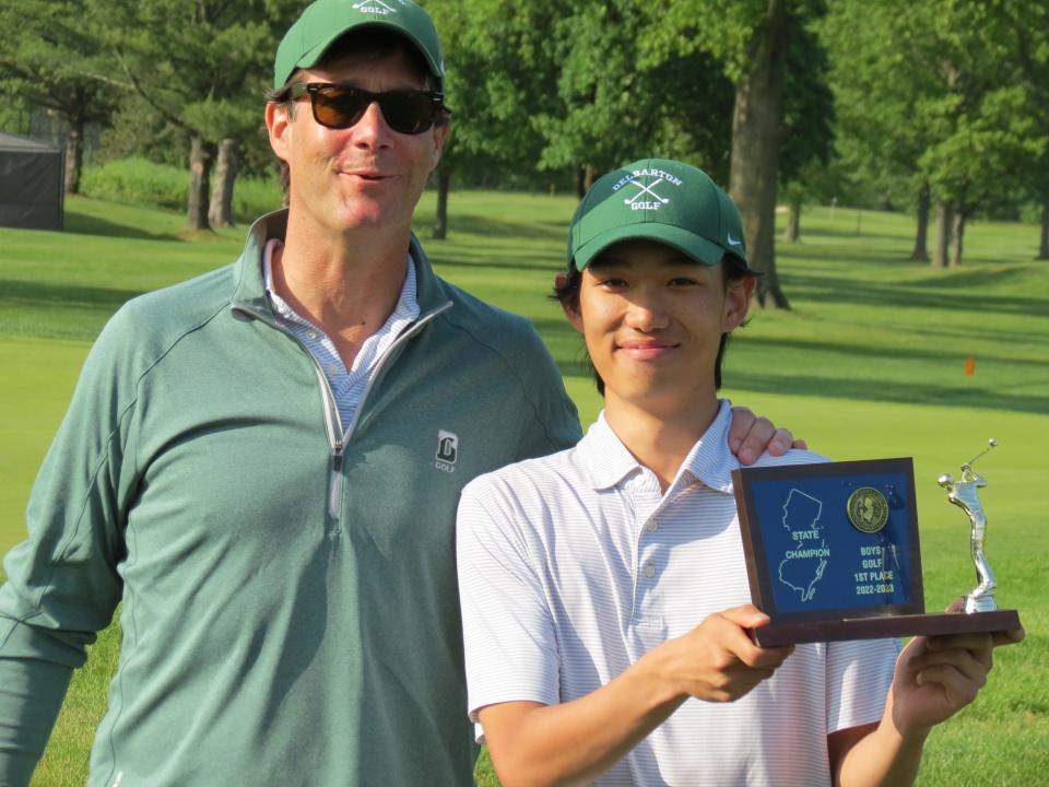 Delbarton's Tyler Lee (right), with coach Sean Flanagan, won the overall title at the NJSIAA State Boys Golf Championship at Raritan Valley CC in Bridgewater on Monday, May 15, 2023.