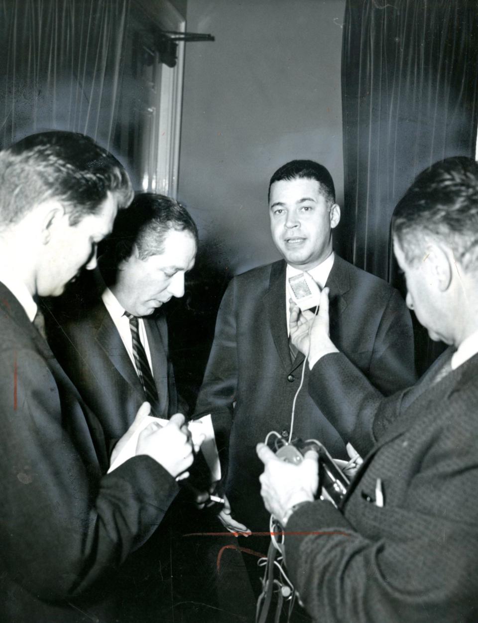 Attorney General Edward W. Brooke speaks to the press in 1961.