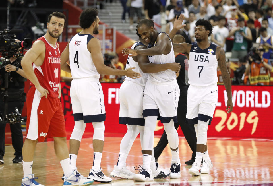 Khris Middleton celebrates with Team USA after narrowly escaping victory. (Reuters)