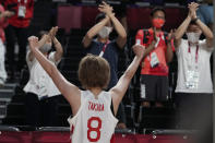 Japan's Maki Takada (8) celebrates with fans after the team's win over Belgium in a women's basketball quarterfinal game at the 2020 Summer Olympics, Wednesday, Aug. 4, 2021, in Saitama, Japan. (AP Photo/Eric Gay)