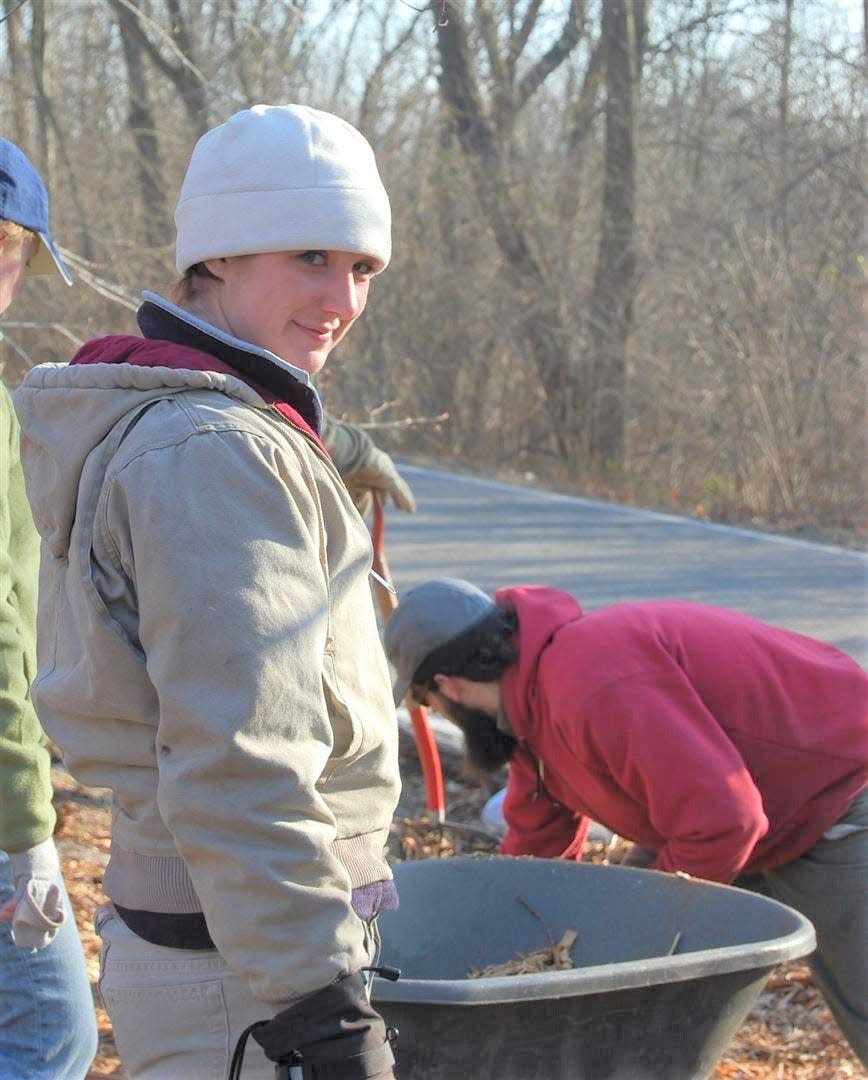 Liz Mortenson Winlock worked as a member of the Woodlands Restoration Team for Louisville Olmsted Parks Conservancy. This photo was taken in Cherokee Park in 2008.