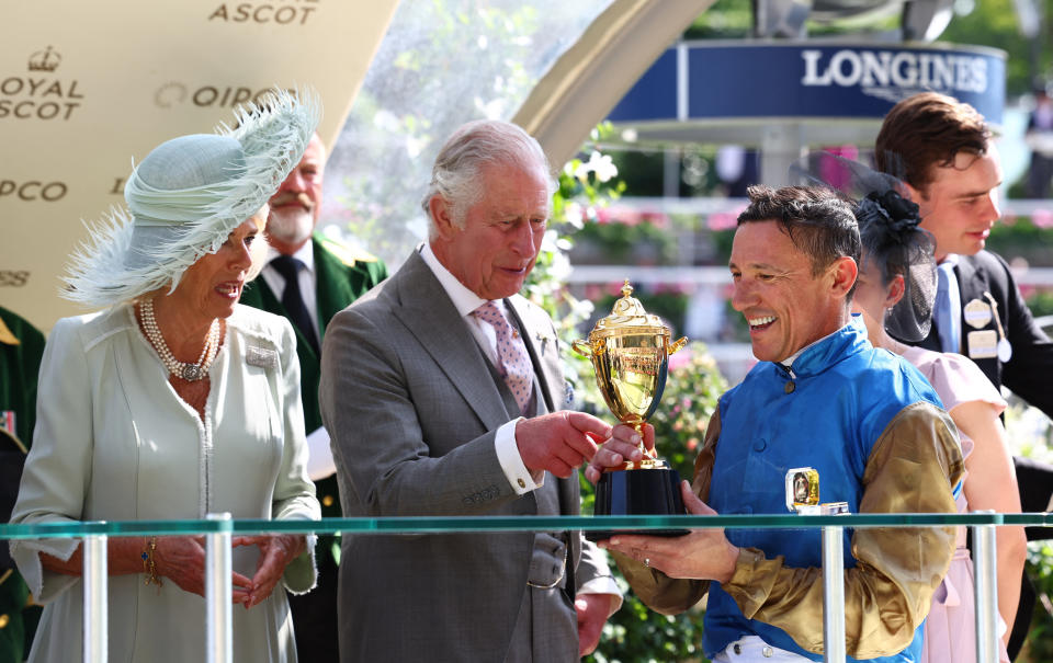 King Charles and Queen Camilla look on as Frankie Dettori celebrates with the trophy after winning the Gold Cup at Royal Ascot (Reuters, via Beat Media Group subscription)