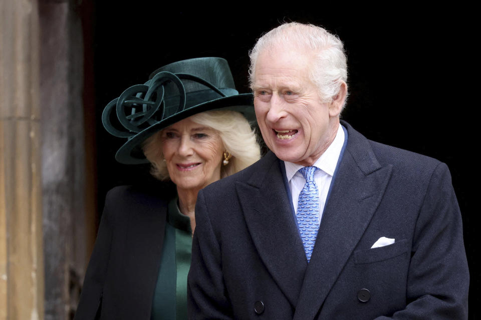 Britain's King Charles III, right, and Queen Camilla leave after attending the Easter Matins Service at St. George's Chapel, Windsor Castle, England, Sunday, March 31, 2024. (Hollie Adams/Pool Photo via AP)