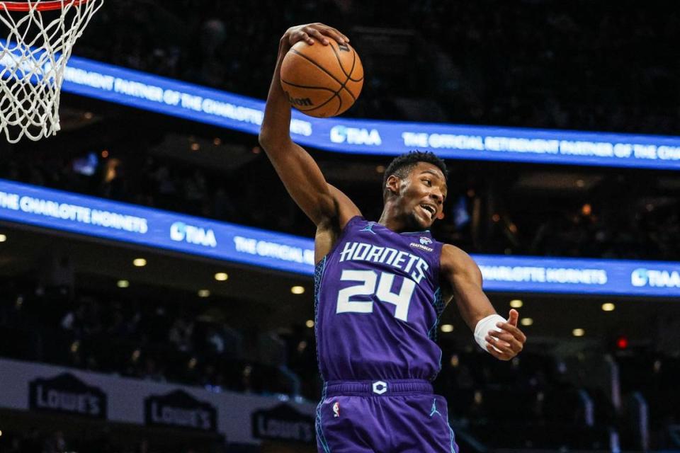 Hornets guard Brandon Miller pulls down a rebound during the game against the Spurs at Spectrum Center on Friday, January 19, 2024.